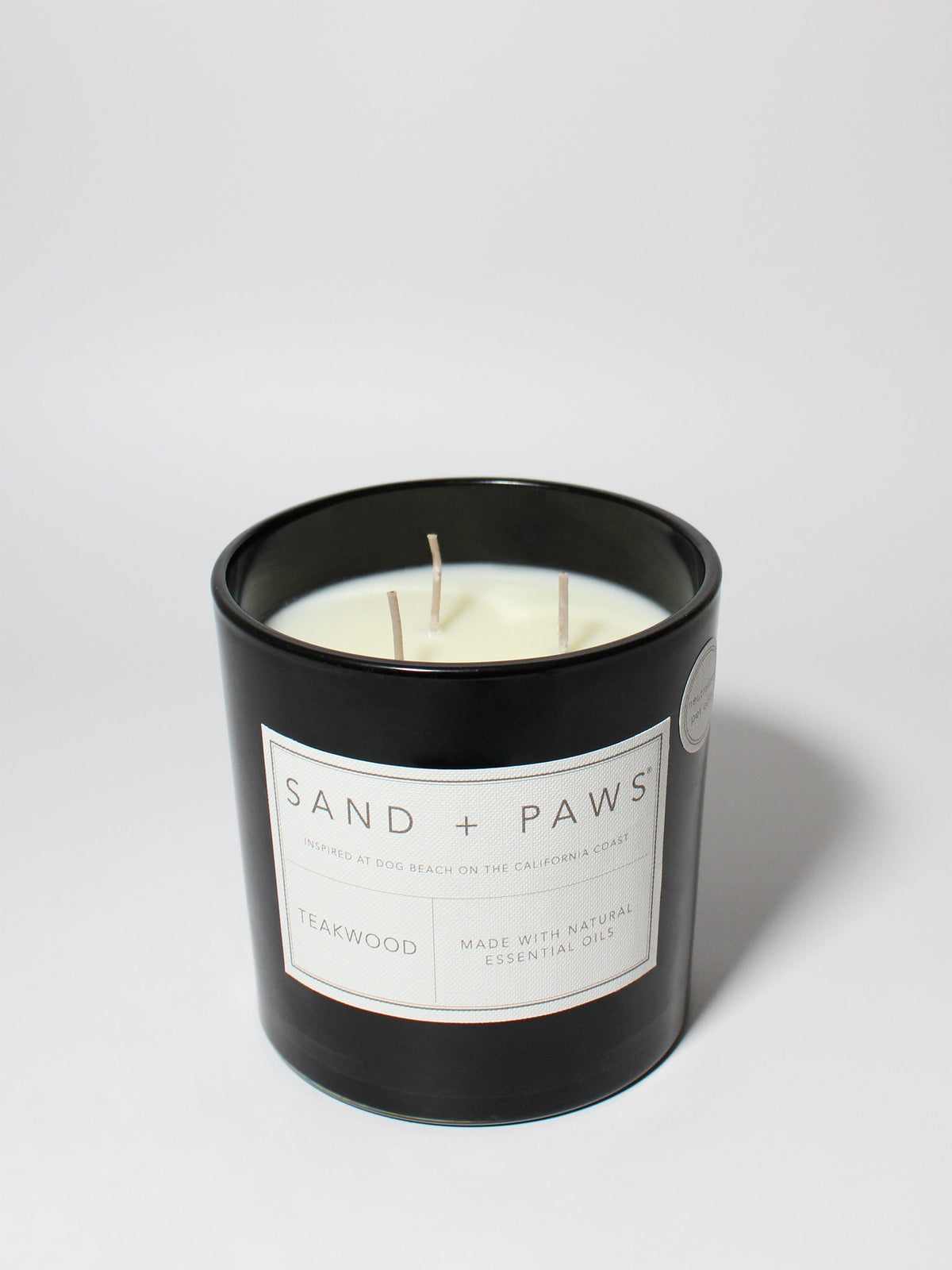 Signature Sand + Paws Teakwood 21 oz scented candle